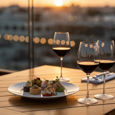 Elegant table setting on a rooftop at sunset